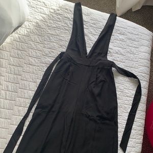 Black sleeveless jumpsuit